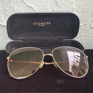 COACH Woman’s Polarized Aviator Sunglasses (HC7094 L1089T)